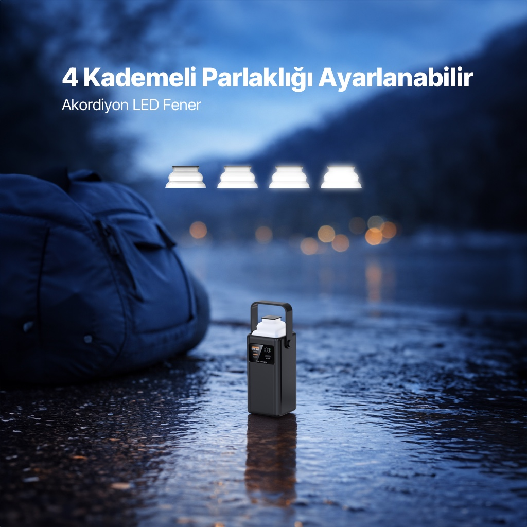 Küçük siyah bir fener, büyük bir çantanın yanında ıslak zeminde duruyor.