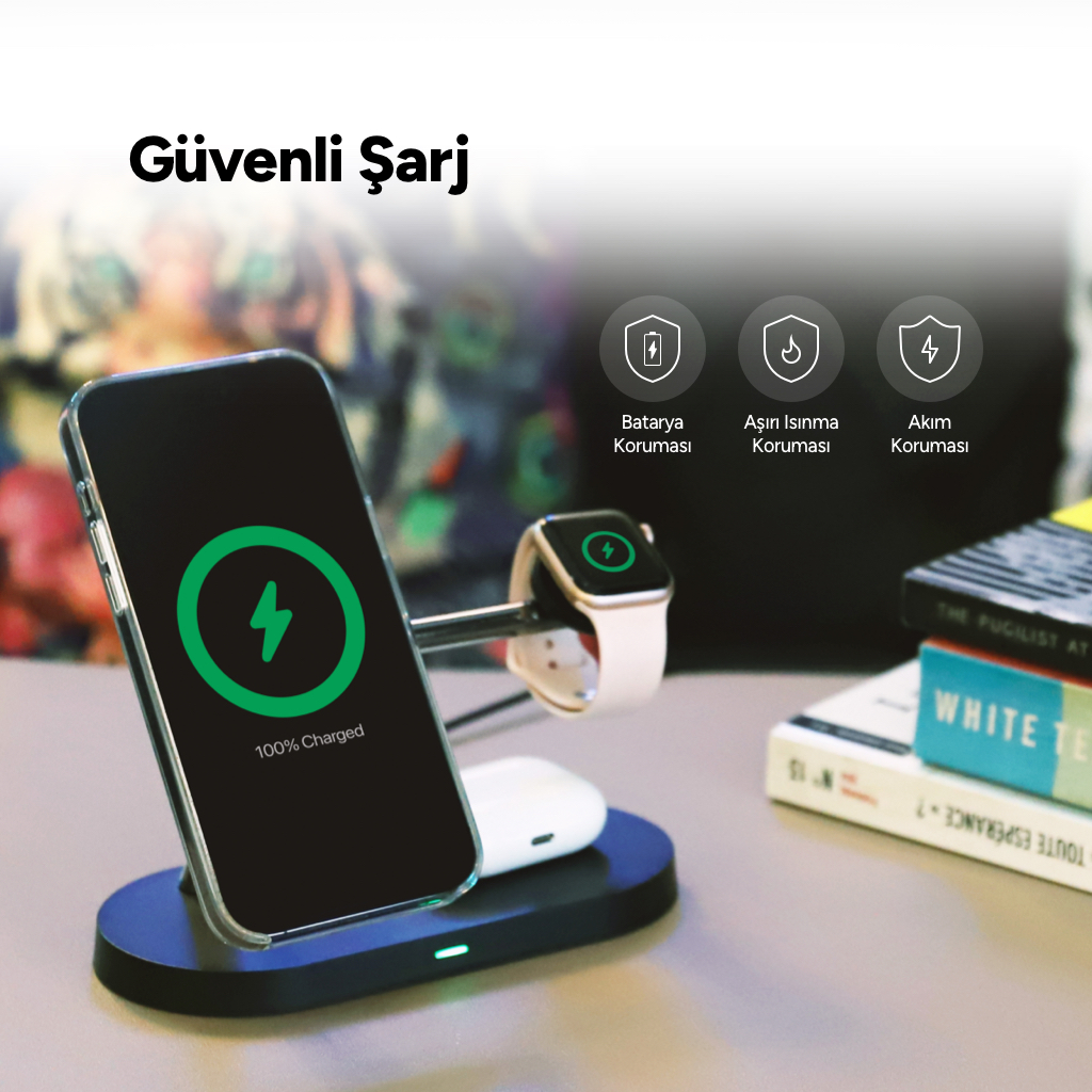 iPhone, Apple Watch ve AirPods'lu şarj standı. iPhone %100 şarj olduğunu gösteriyor.