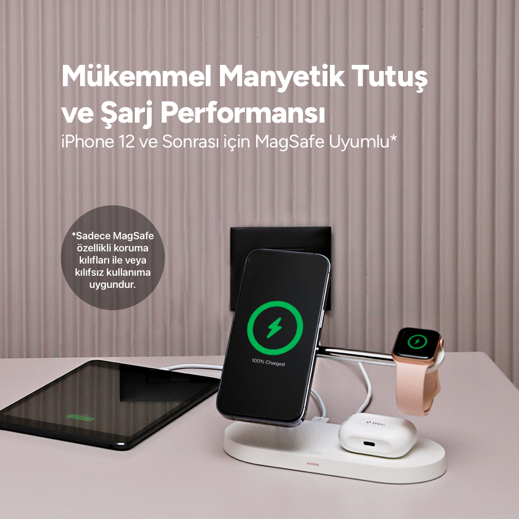 Bir iPhone, Apple Watch ve AirPods şarj istasyonunda şarj oluyor.