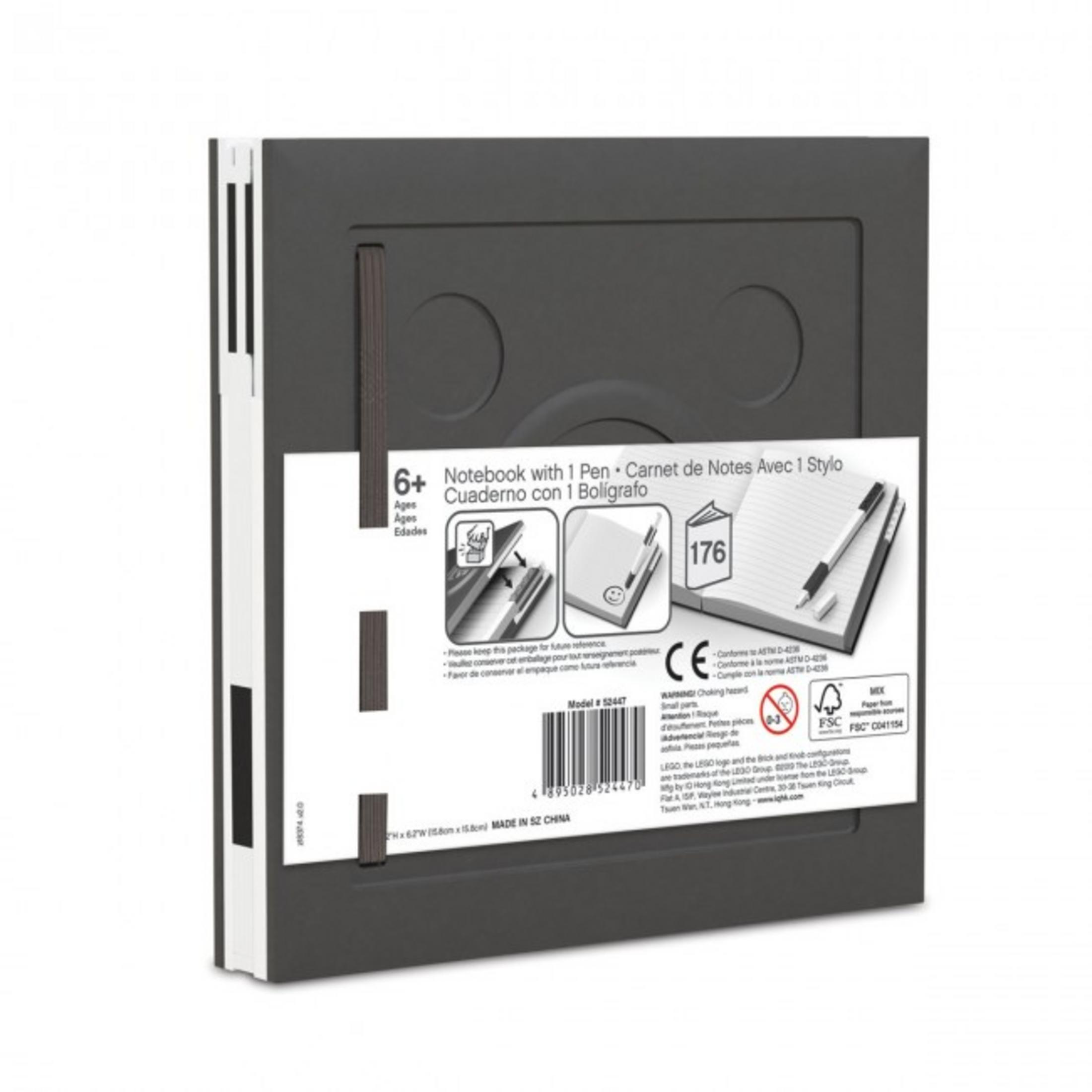 Cuaderno negro con bolígrafo, 6+ años, con detalles del producto y advertencias.