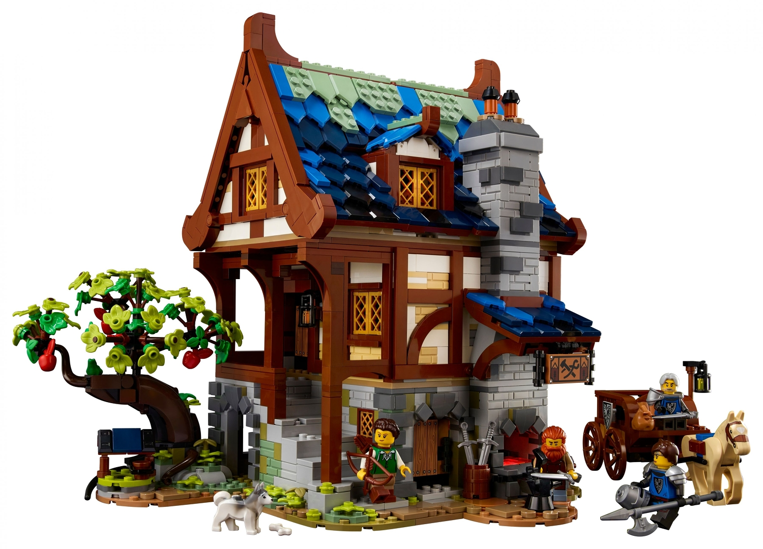 Ein mittelalterliches Lego-Gebäude mit Figuren, Baum, Wagen und Pferd.
