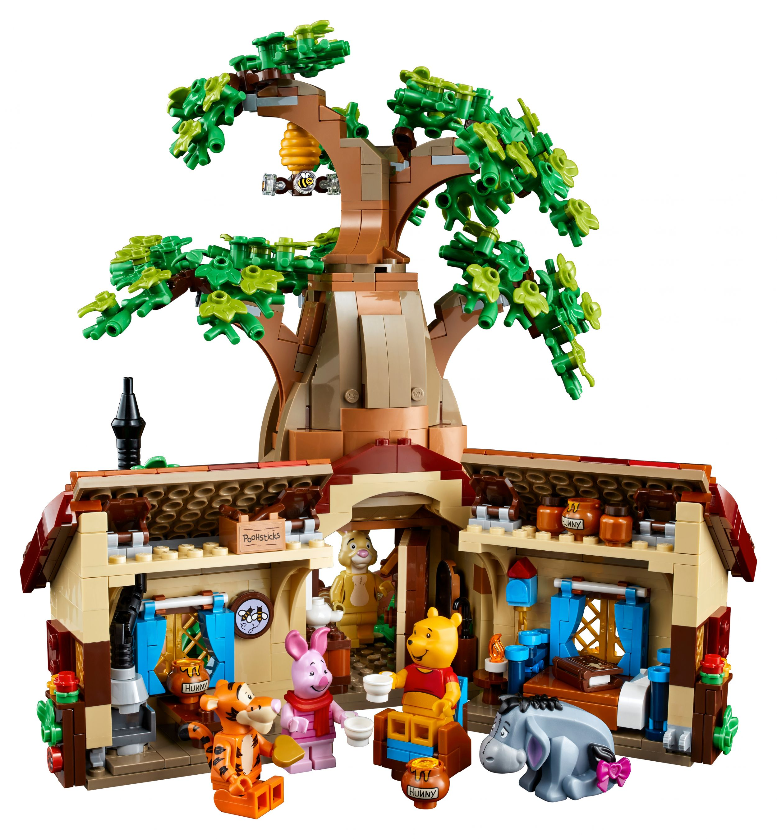 LEGO Winnie Puuh Haus mit Figuren und Baum. Bienenstock und Honigtöpfe.