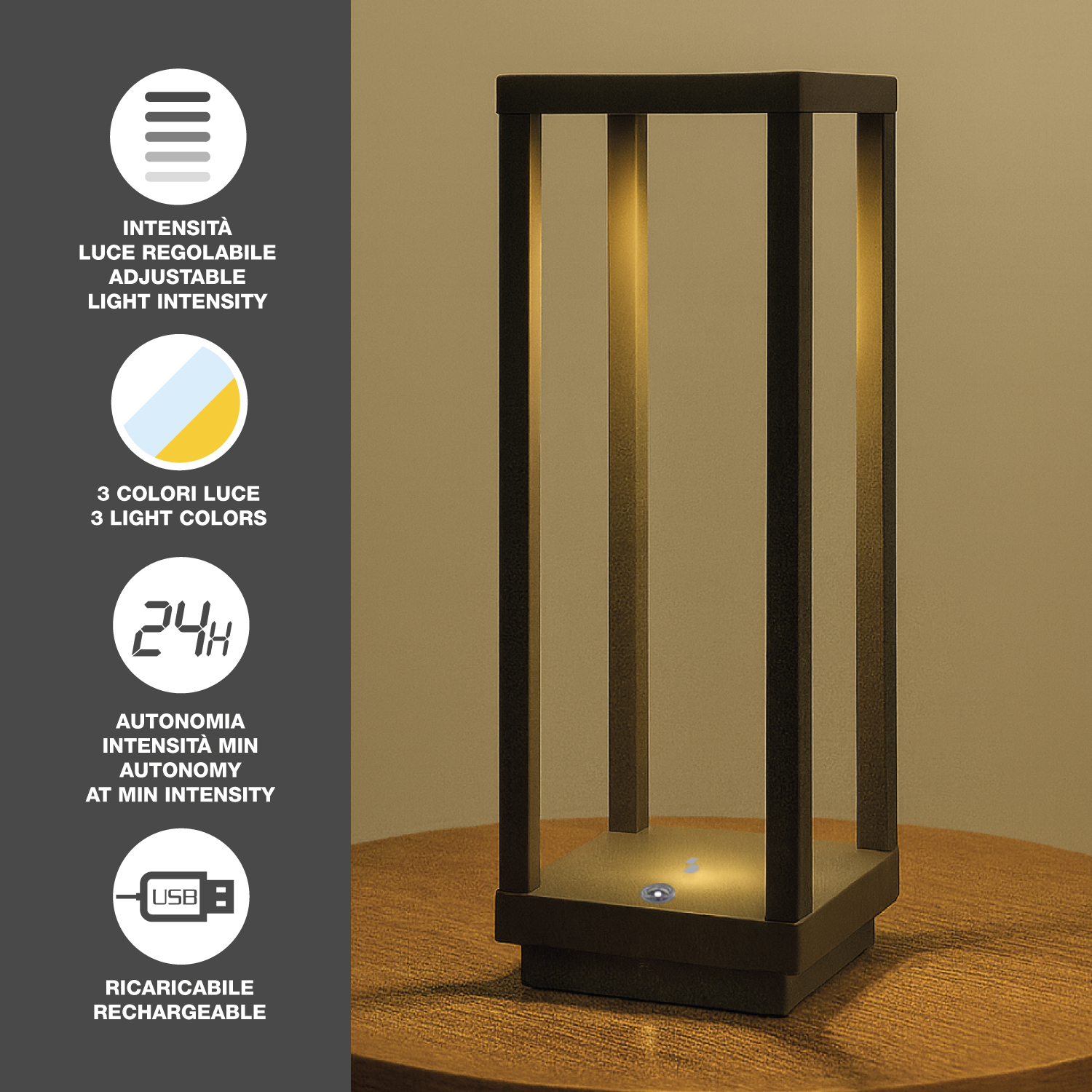 Lampada grigio scuro a tre colonne con luce calda, su tavolo in legno. Icone a sinistra: intensità, colore, batteria 24h, USB.