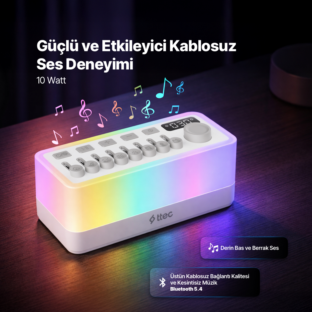Gökkuşağı aydınlatmalı ve kontrol düğmeli beyaz hoparlör.