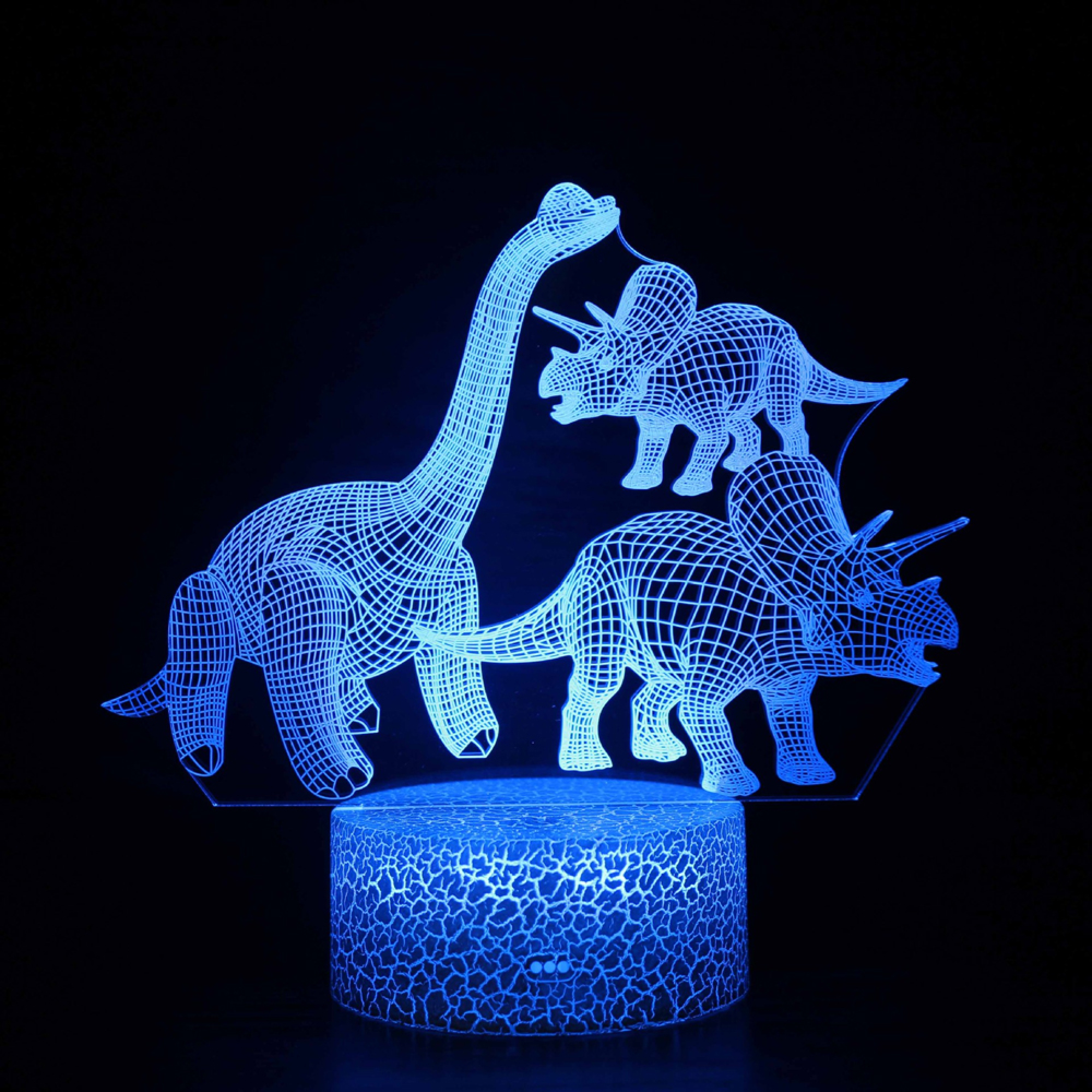 Eine blaue 3D-Dinosaurierlampe mit drei Dinosauriern auf einem Riss-Muster-Sockel.