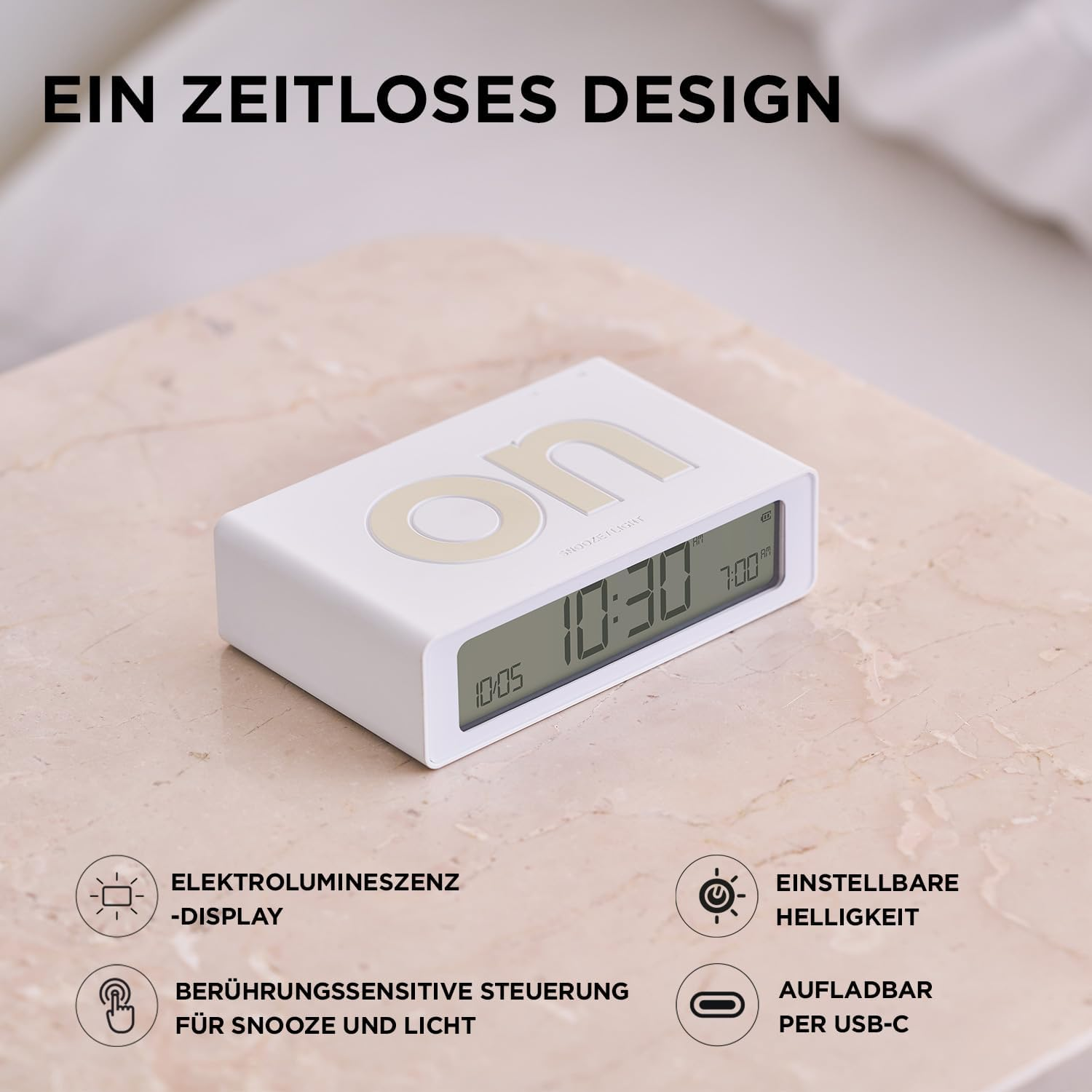 Ein weißer digitaler Wecker mit 