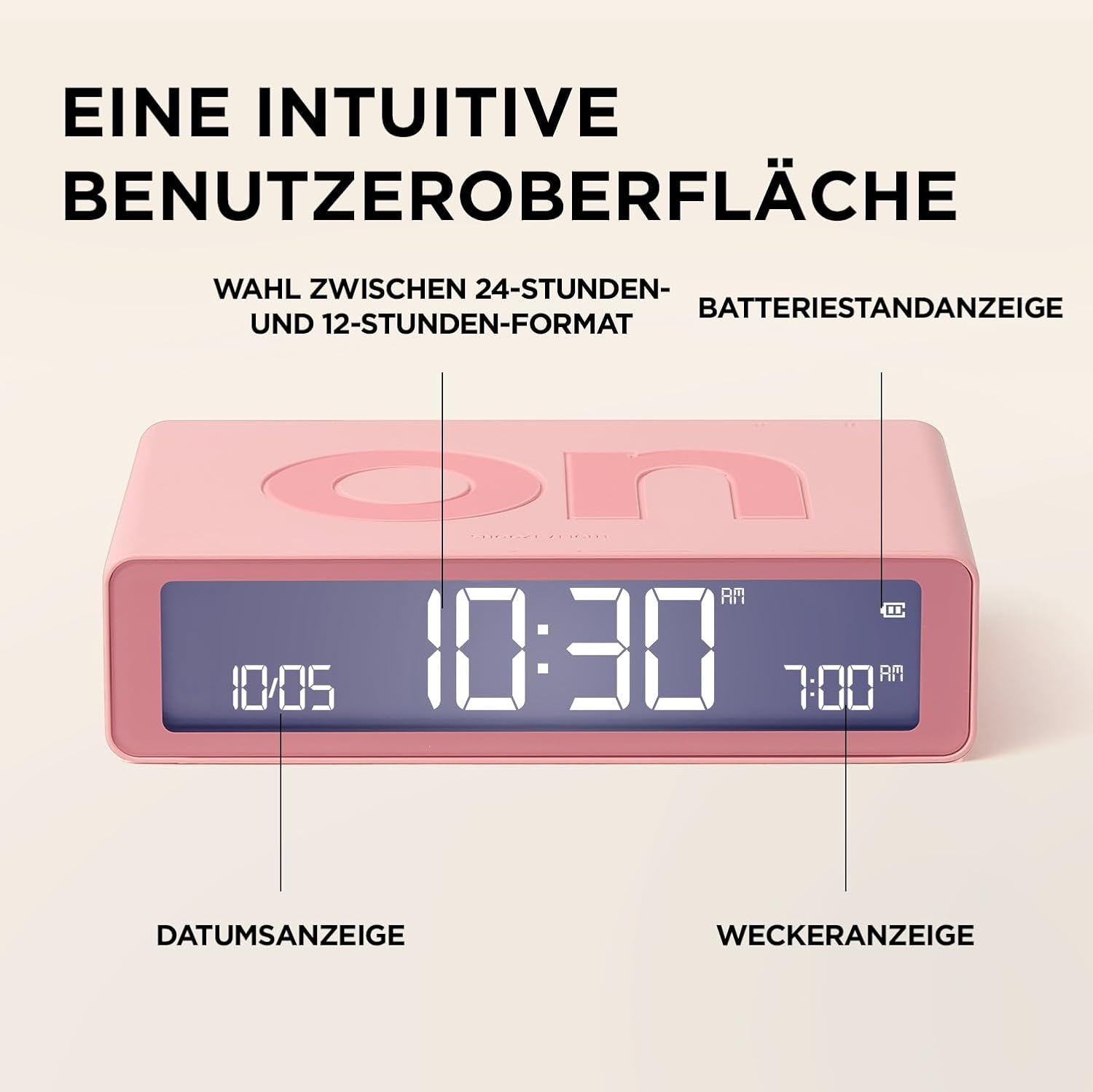 Ein rosafarbener Wecker mit digitaler Anzeige. Zeigt Uhrzeit, Datum und Wecker an.