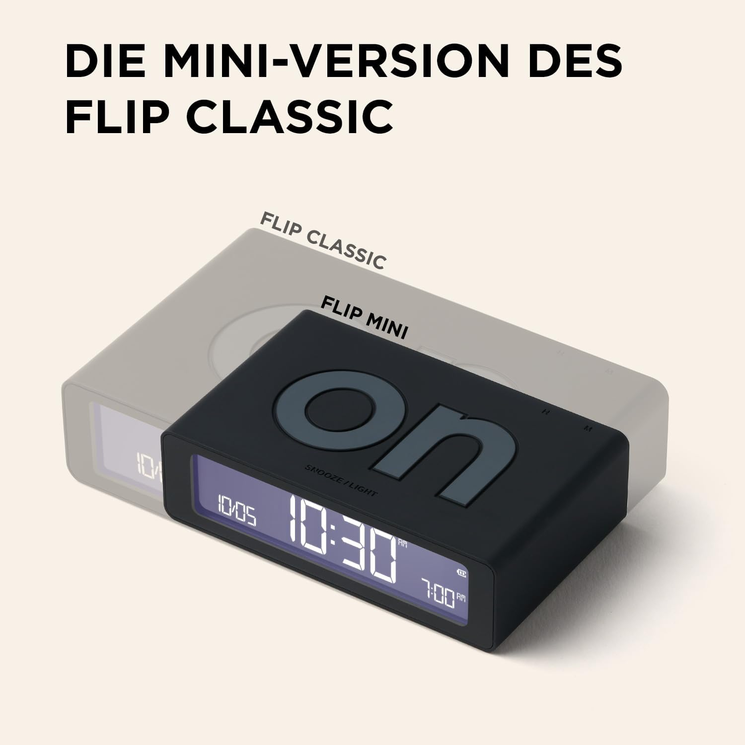 Ein schwarzer Flip Mini Wecker steht vor einem grauen Flip Classic Wecker.