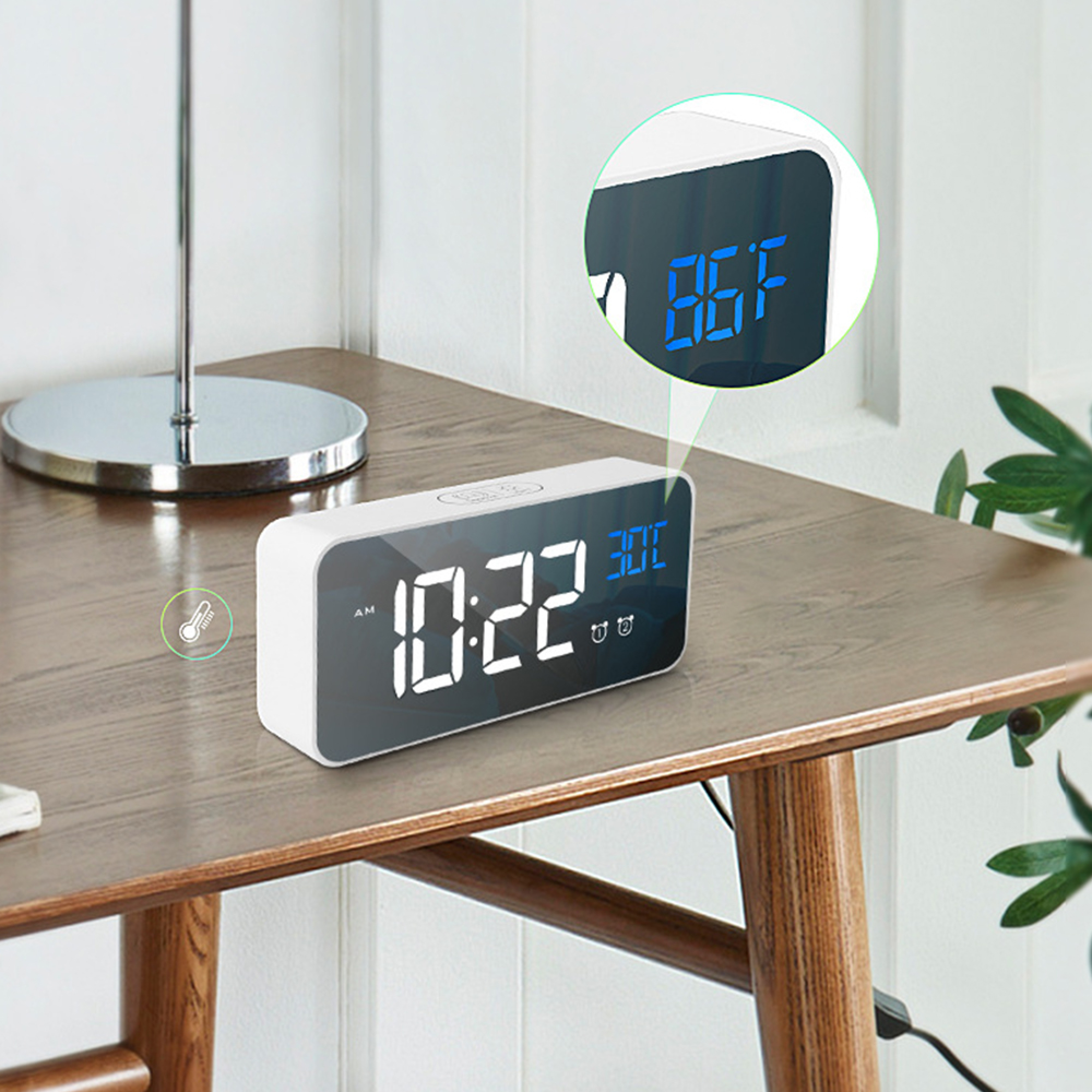 Digitaler Wecker zeigt 10:22 Uhr und 86F an. Ein Thermometersymbol ist in der Nähe.