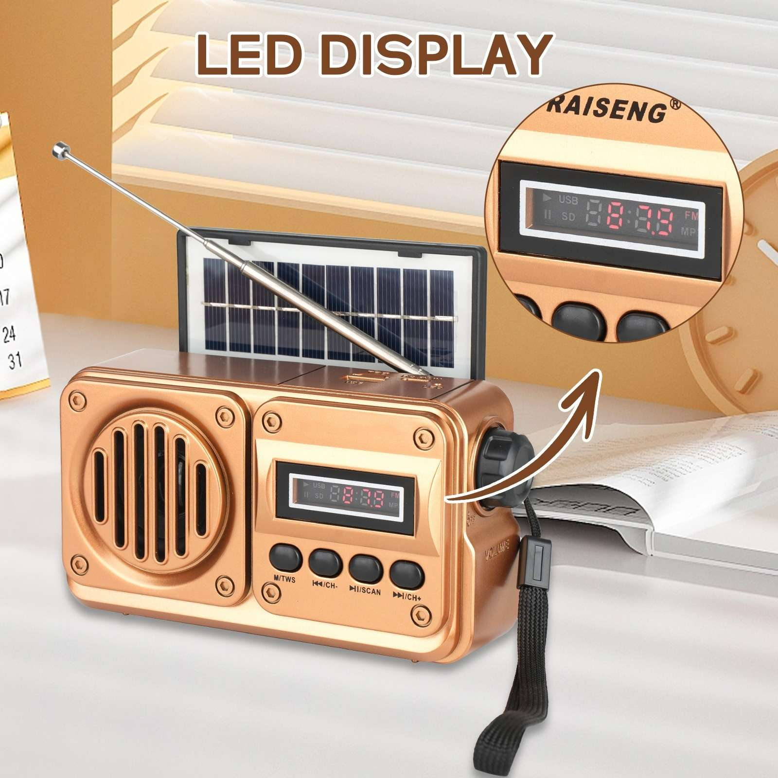 Goldener Radio mit Solarpanel, Teleskopantenne und LED-Anzeige.