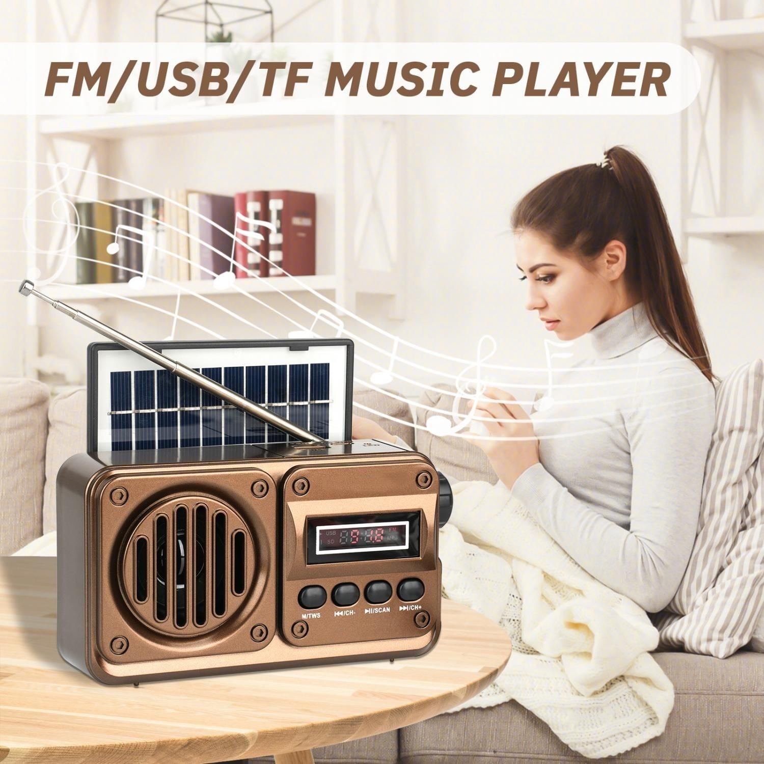 Ein bronzener Radio-Musikplayer mit Solarpanel, Antenne und Bedienknöpfen.