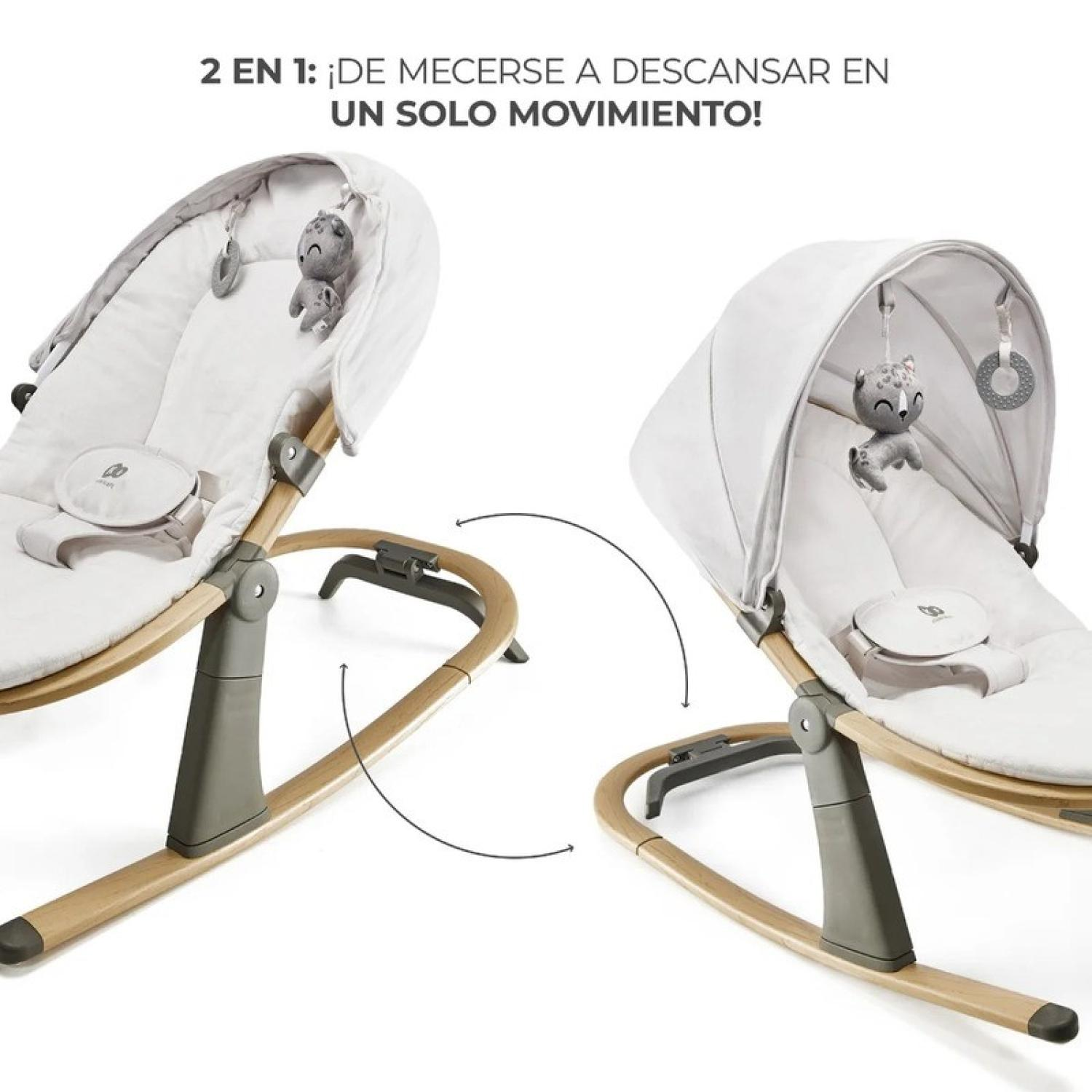 Ein weißer Babywippen mit Holzgestell und Spielzeug. Links und rechts daneben.