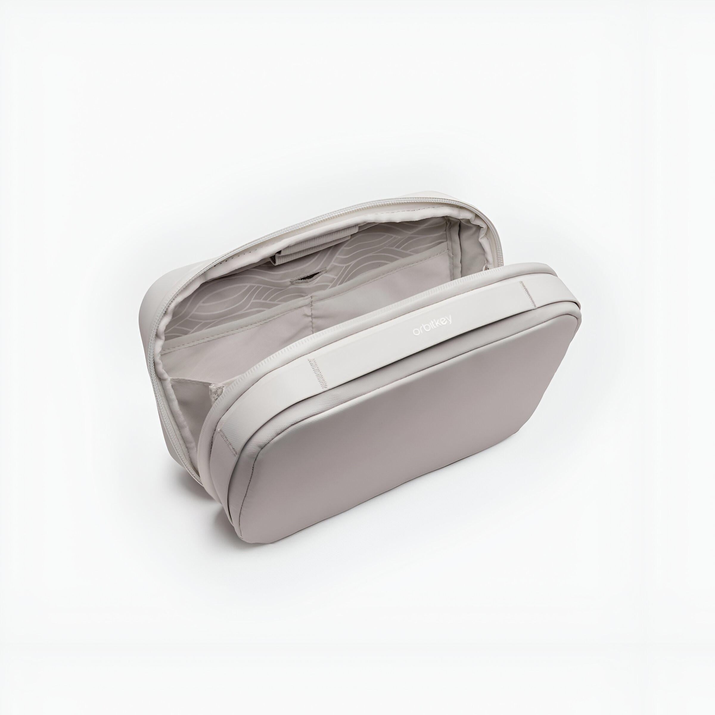 Szara kosmetyczka Orbitkey z otwartą komorą, ukazującą wiele kieszeni.