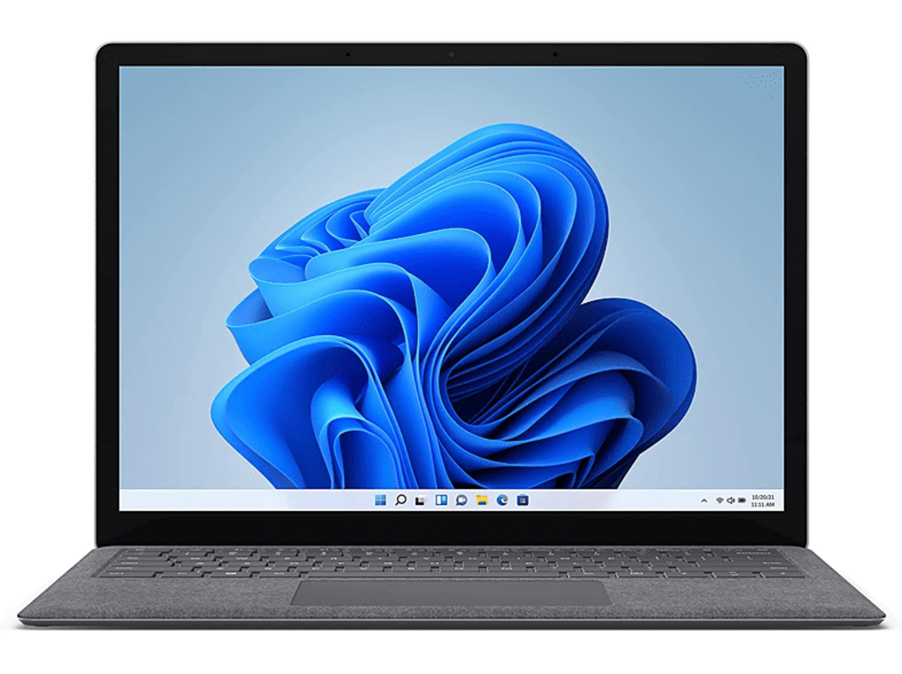 Ein grauer Laptop mit einem blauen Wellen-Hintergrundbild und einer Tastatur.