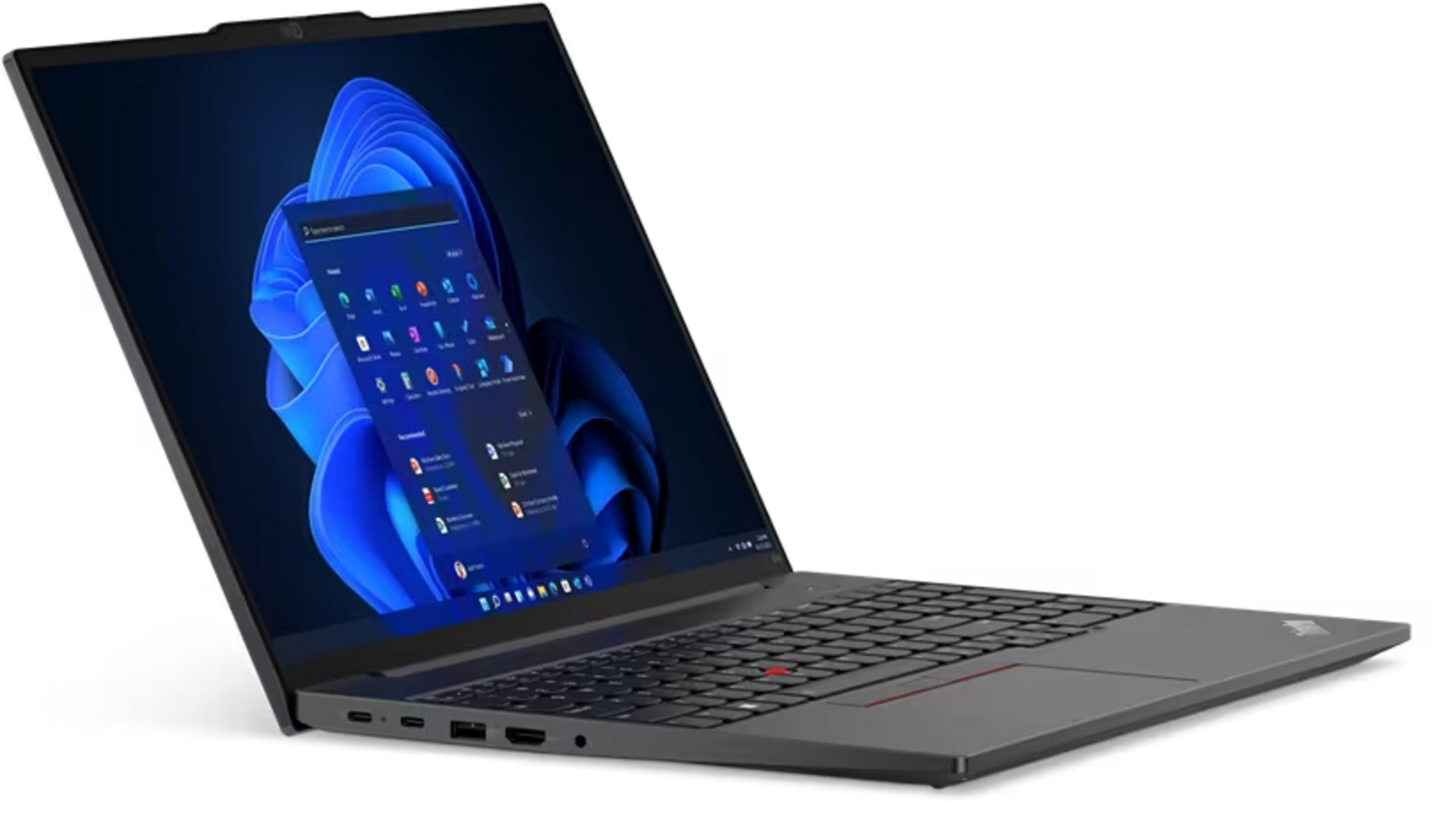 Ein dunkler Laptop mit geöffnetem Bildschirm, auf dem eine blaue Wellen-Tapete und ein App-Fenster angezeigt werden.