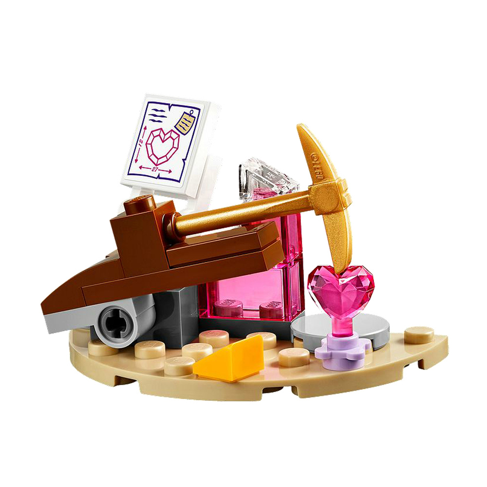 Set miniera LEGO con piccone dorato, gemma a cuore rosa e diagramma.
