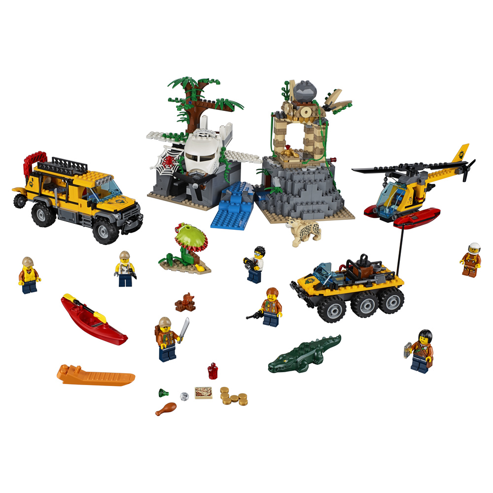 Set LEGO giungla con veicoli, aereo, elicottero, figure e rovine.