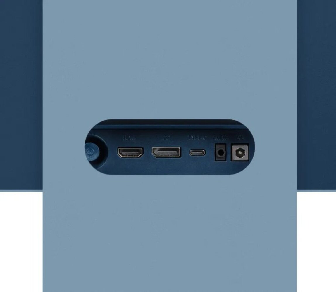 Un dispositivo azul con puertos: HDMI, USB-C, audio y alimentación CC.