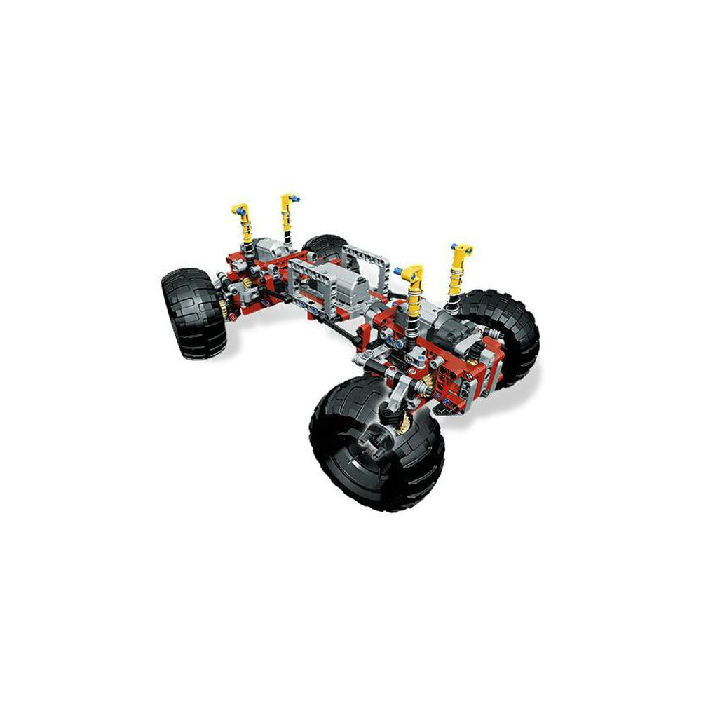 Telaio auto Lego Technic rosso e grigio con grandi ruote nere e dettagli gialli.
