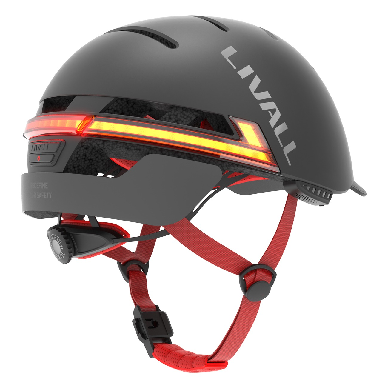 Ein schwarzer Helm mit roten Gurten und integrierten gelben LED-Lichtern.
