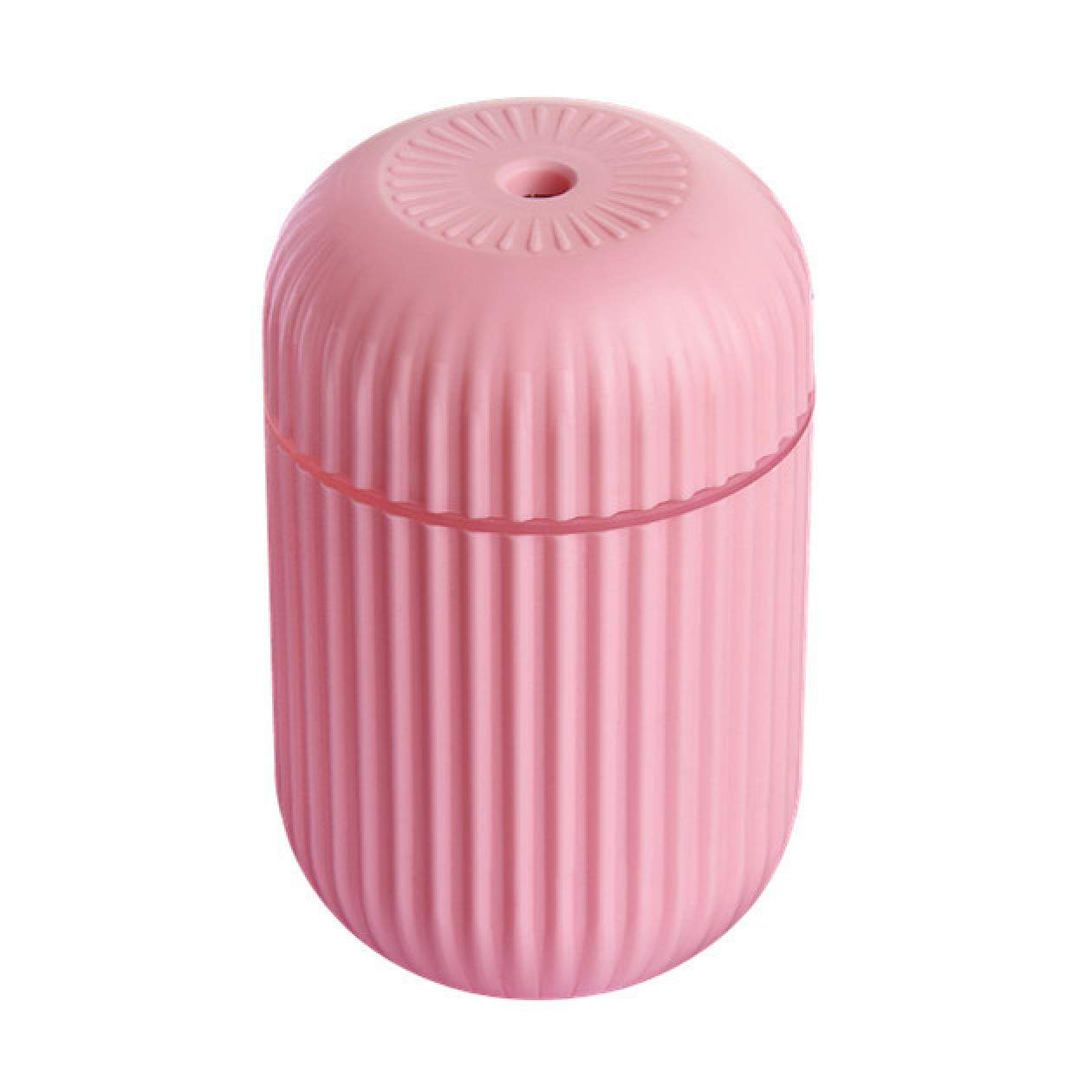 Ein kleiner, gerippter, pinker Behälter mit einem runden Deckel und einer kleinen Öffnung oben.