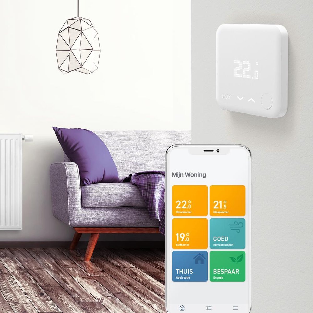 A smart home thermostat and smartphone showing heating controls. A sofa is in the foreground.