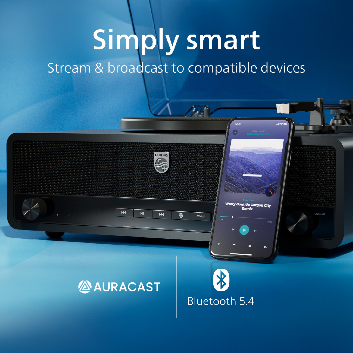 Hoparlörlü siyah pikap, yanında müzik uygulaması gösteren akıllı telefon.