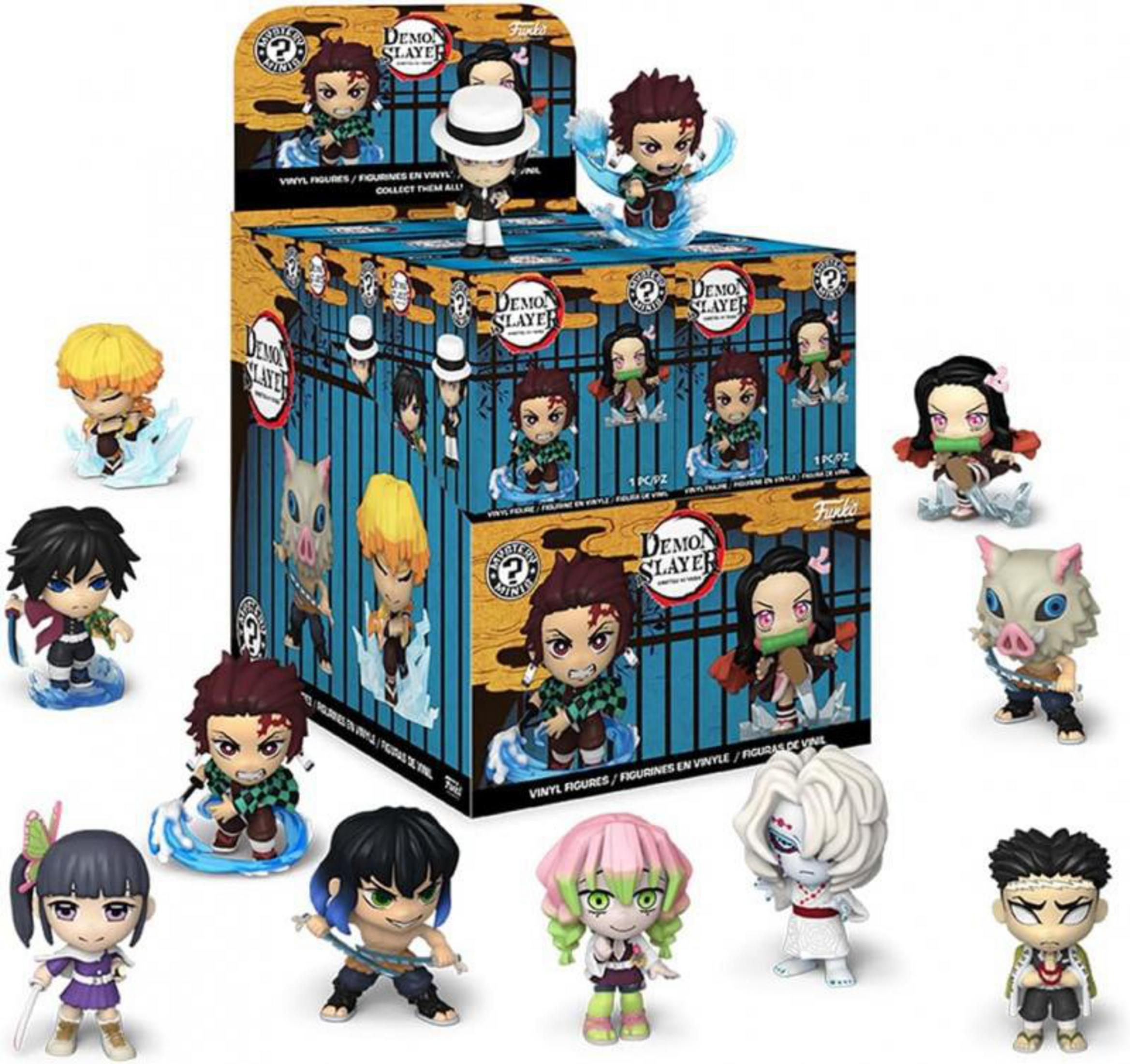 Figurines Chibi Demon Slayer, certaines en boîte, d'autres à côté.