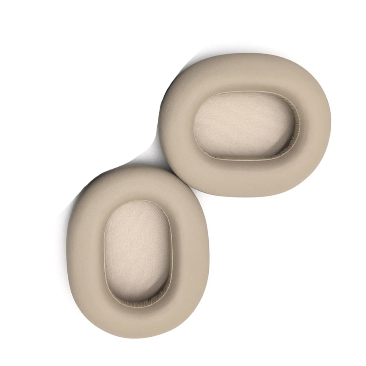 Zwei beige Ohrpolster auf weißem Hintergrund.
