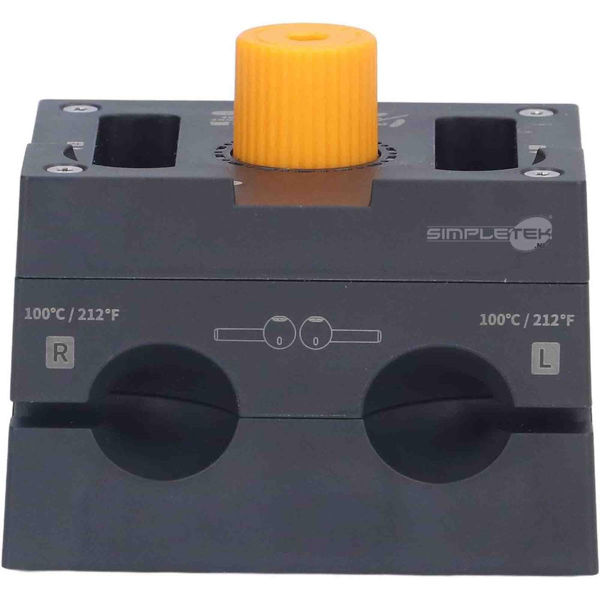 Un dispositivo grigio con manopola gialla ed etichette 100°C/212°F, R e L.