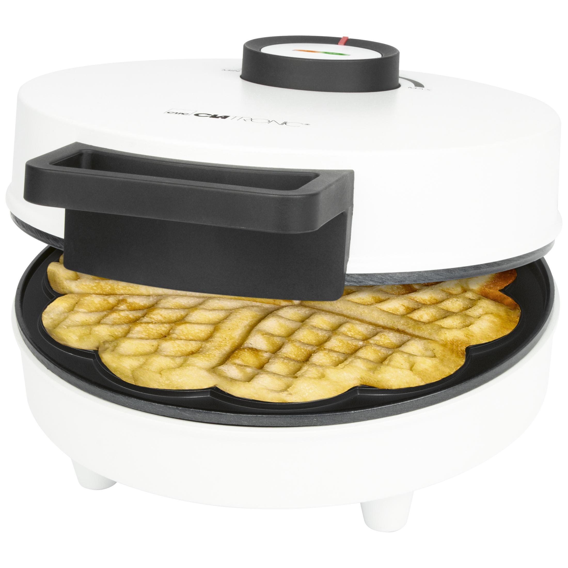 Ein weißer Waffelautomat mit einem goldenen Waffel im Inneren.