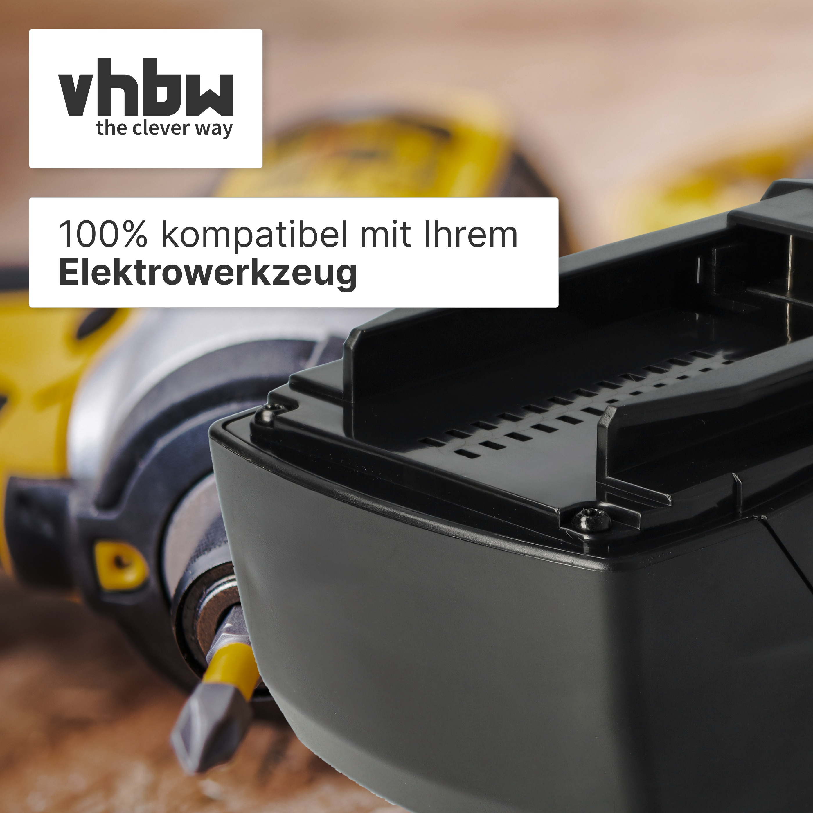 Schwarzer Akku für Elektrowerkzeuge neben einem gelben Bohrer.