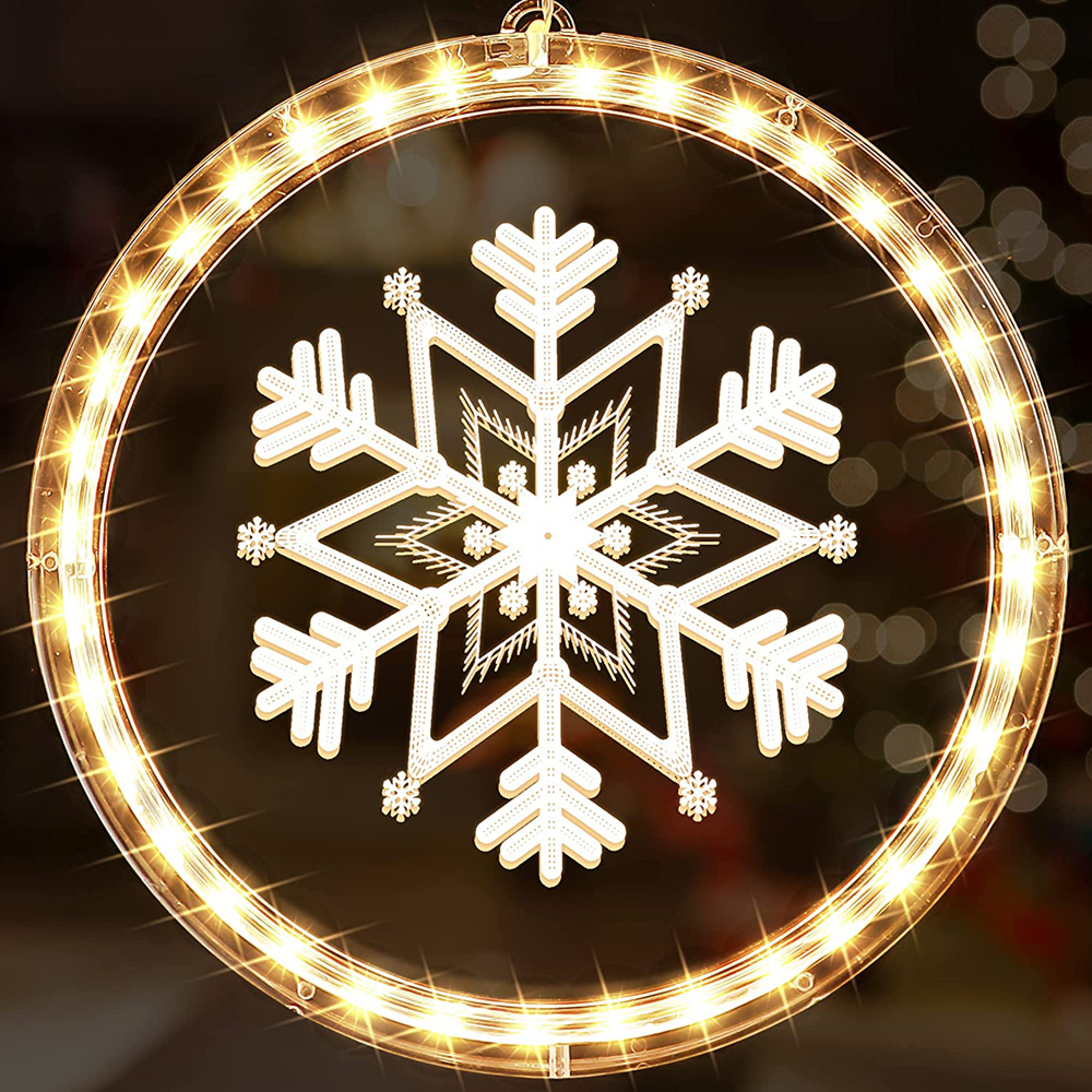 Ein leuchtendes Schneeflocken-Fensterlicht mit warmweißen LEDs in einem Ring.