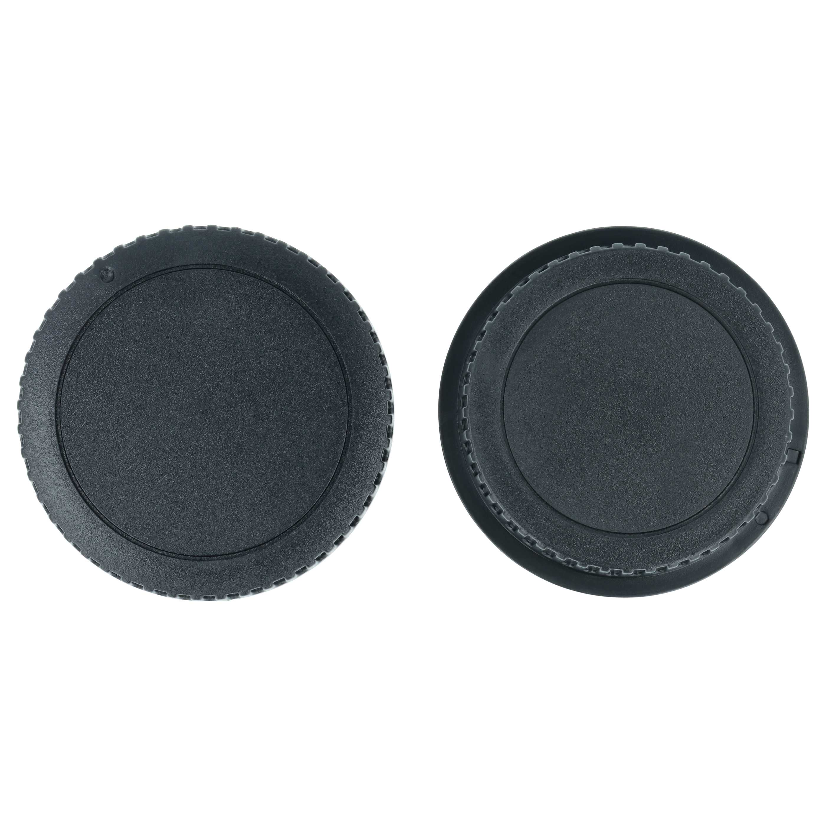 Zwei schwarze Objektivdeckel auf weißem Hintergrund.