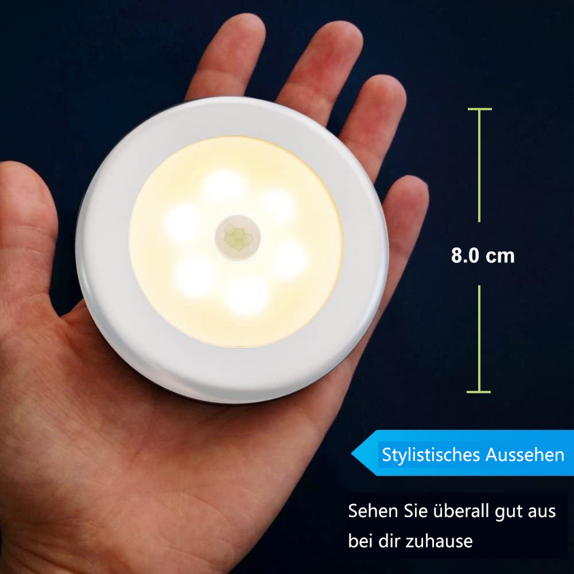 Eine weiße LED-Lampe mit 6 Lichtern wird von einer Hand gehalten.