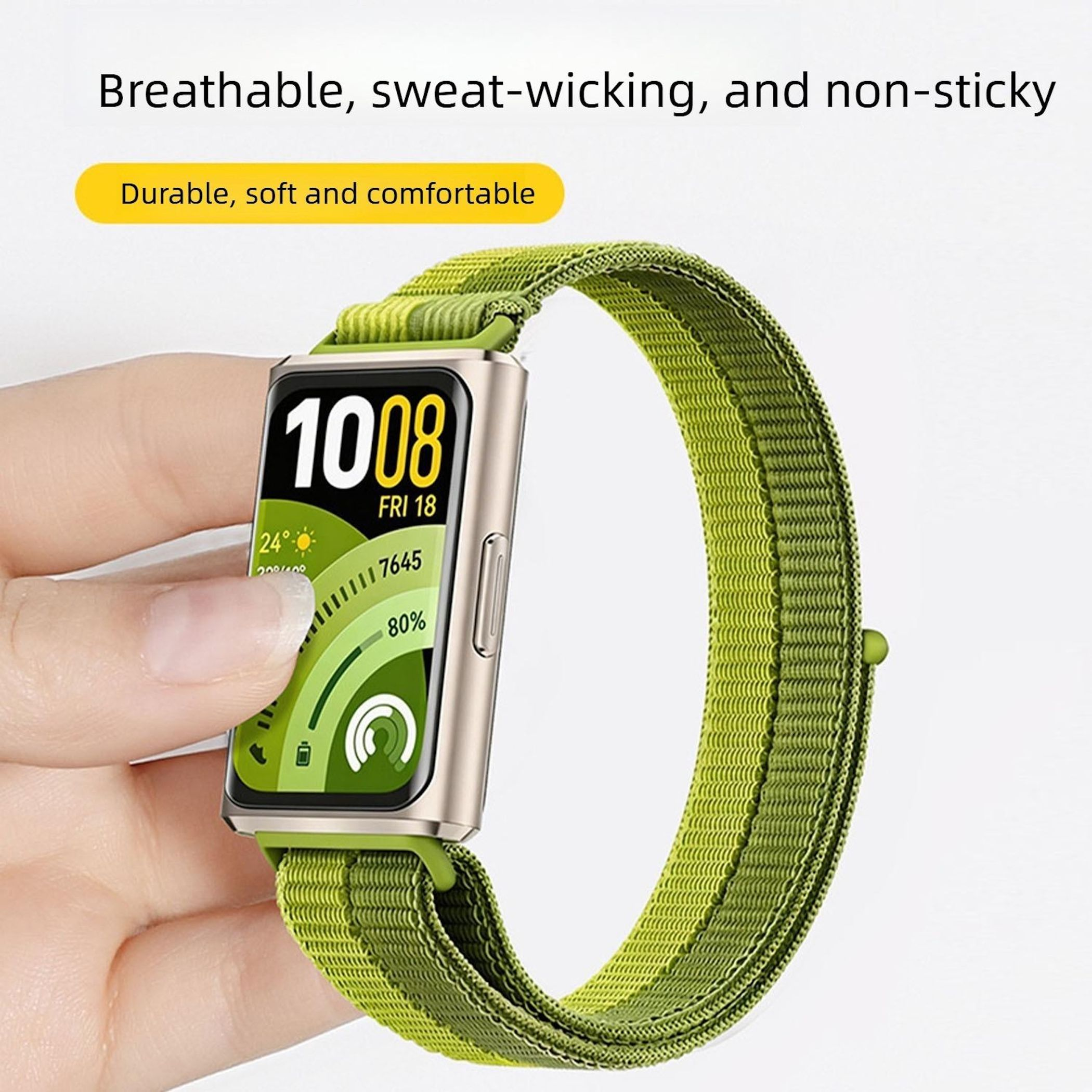 Ein Finger hält ein goldfarbenes Smartwatch-Gehäuse mit einem grünen Armband.