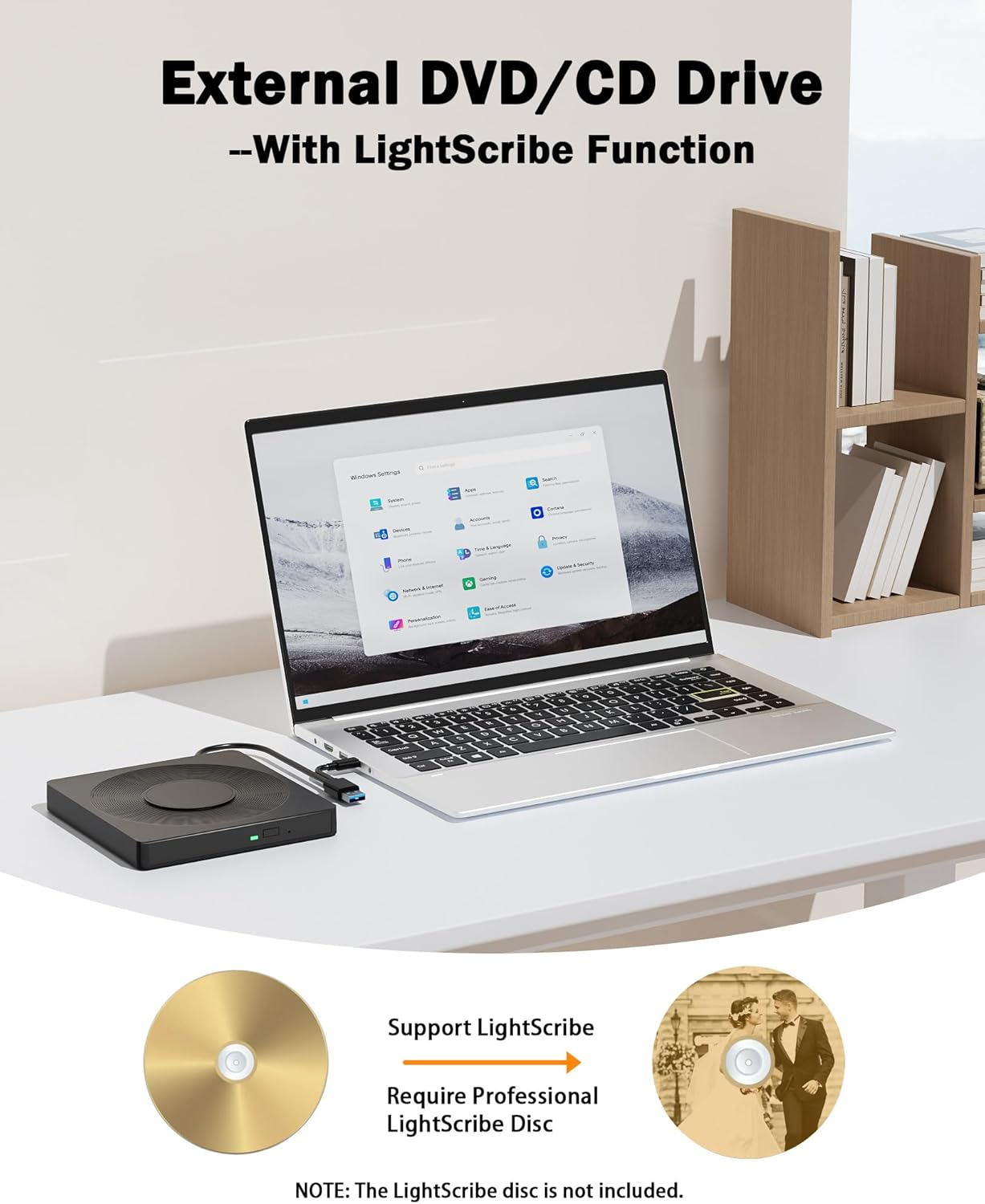 Ein externer DVD/CD-Brenner mit LightScribe-Funktion ist mit einem Laptop verbunden.