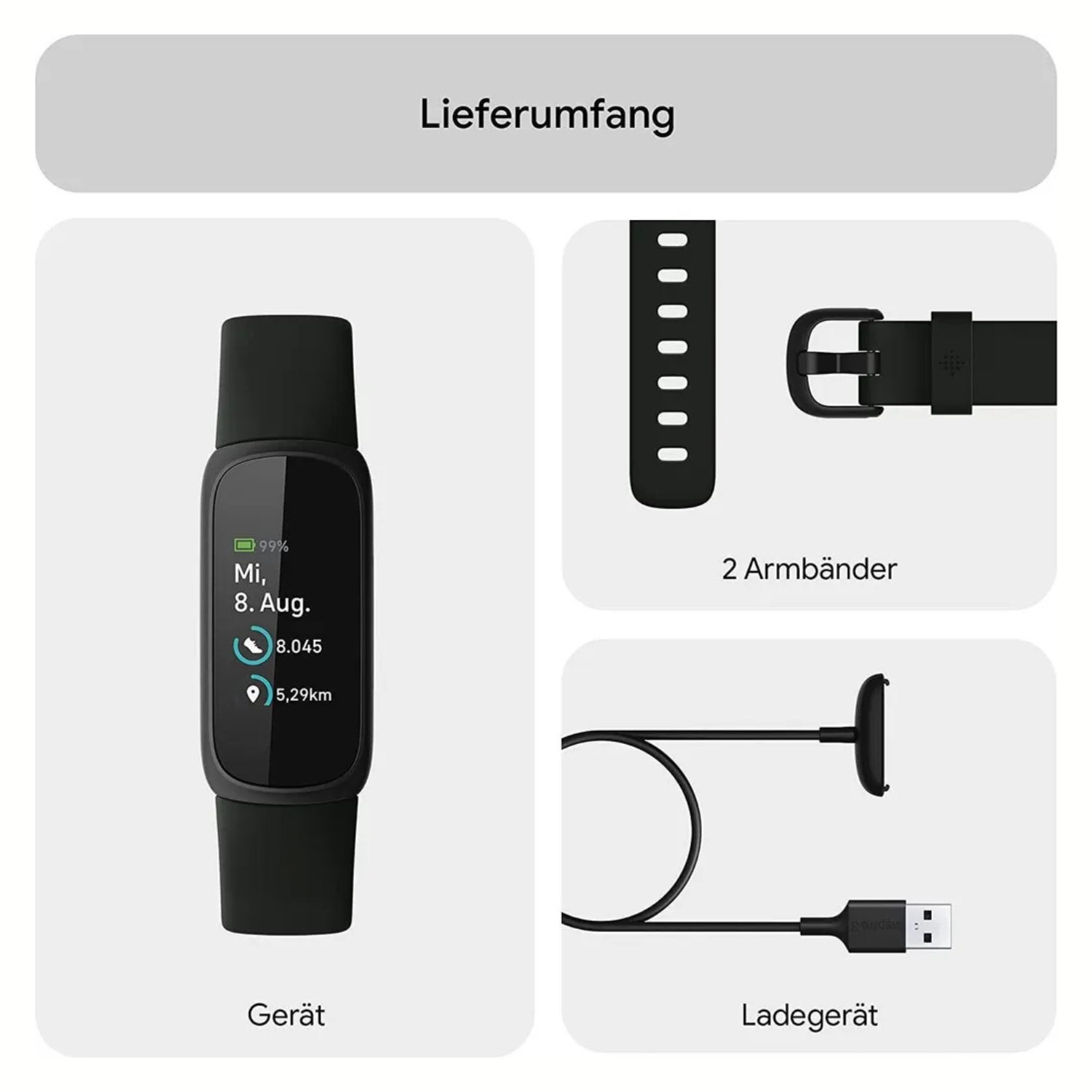 Fitbit-Gerät, zwei Bänder und Ladegerät in einer Anordnung.