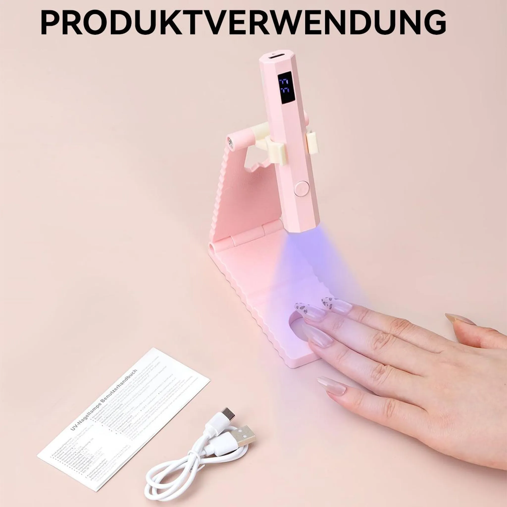 Ein rosa Nagel-UV-Lichthärtungsgerät mit einer Hand und einem USB-Kabel.