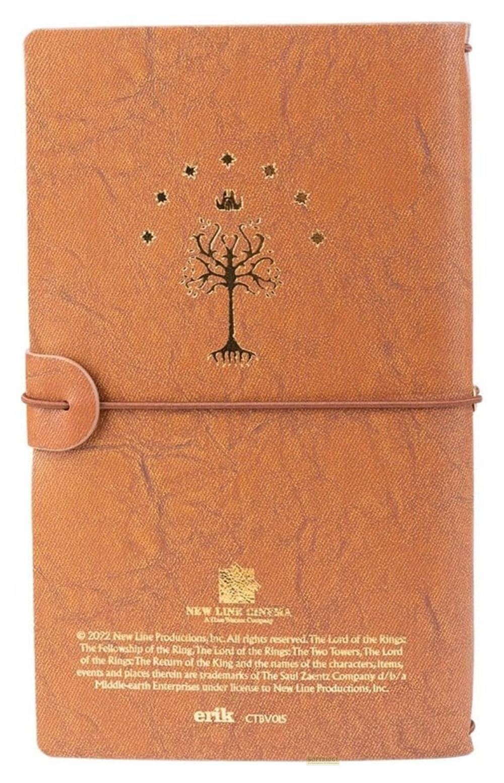 Ein braunes Notizbuch mit einem Baum und Sternenmotiv.