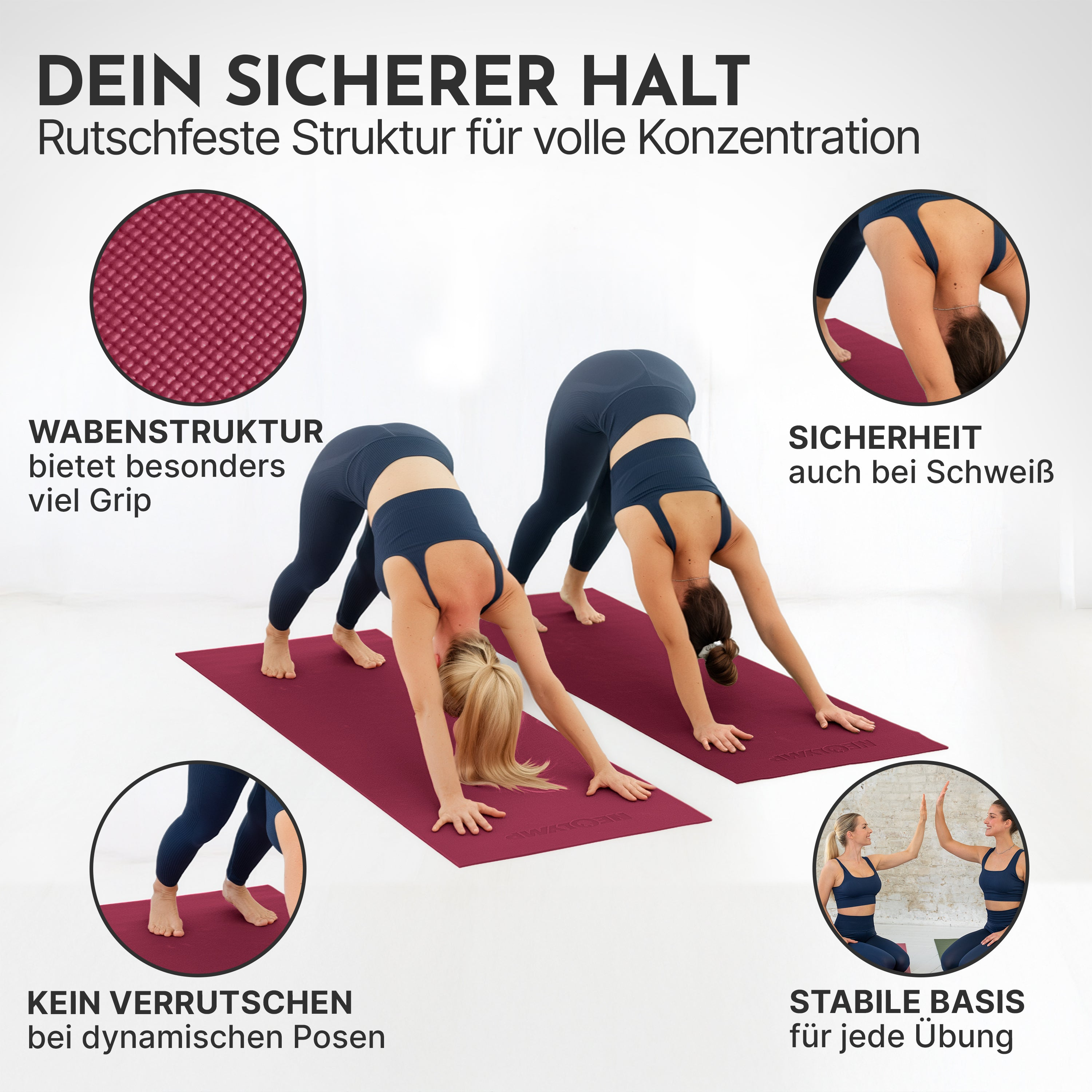 Zwei Frauen in dunkler Sportkleidung machen Yoga auf roten Matten. Wabenstruktur und sicherer Halt.