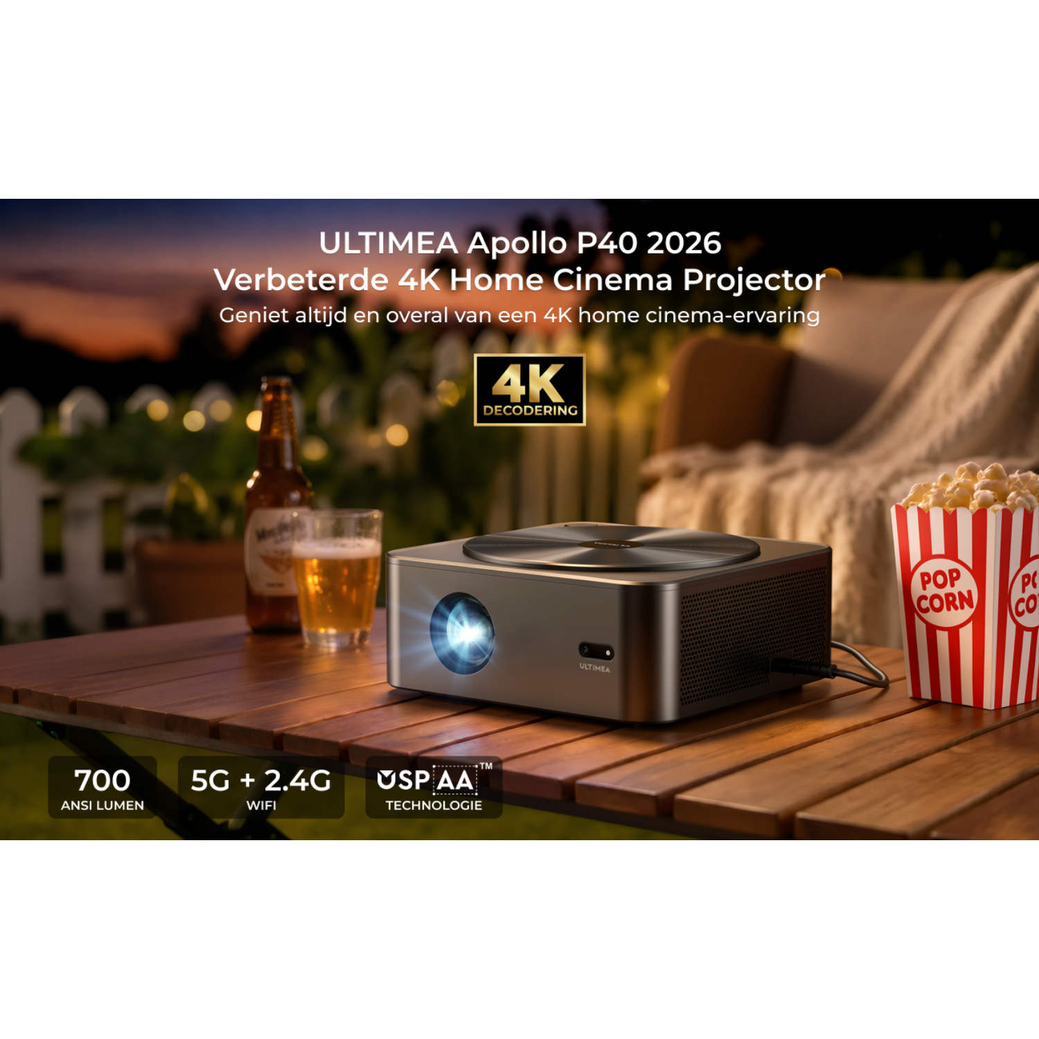 Projecteur Ultima avec bière et pop-corn en extérieur au coucher du soleil.