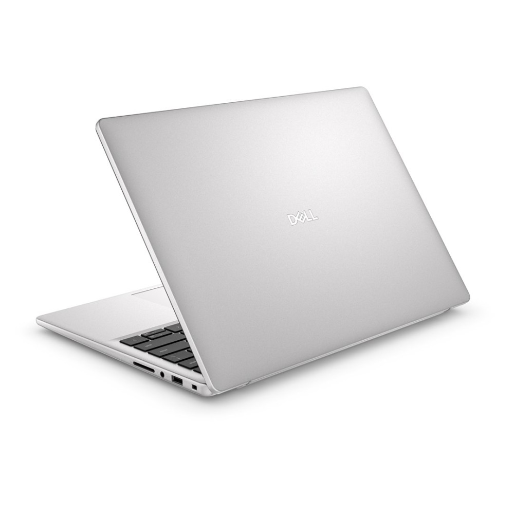 Srebrny laptop Dell pokazany jest pod lekko podniesionym kątem, otwarty z widoczną klawiaturą.