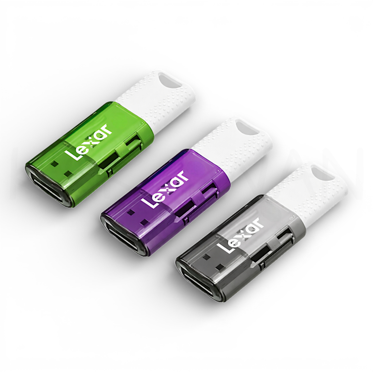 Tres memorias USB Lexar en verde, morado y gris con tapas blancas.
