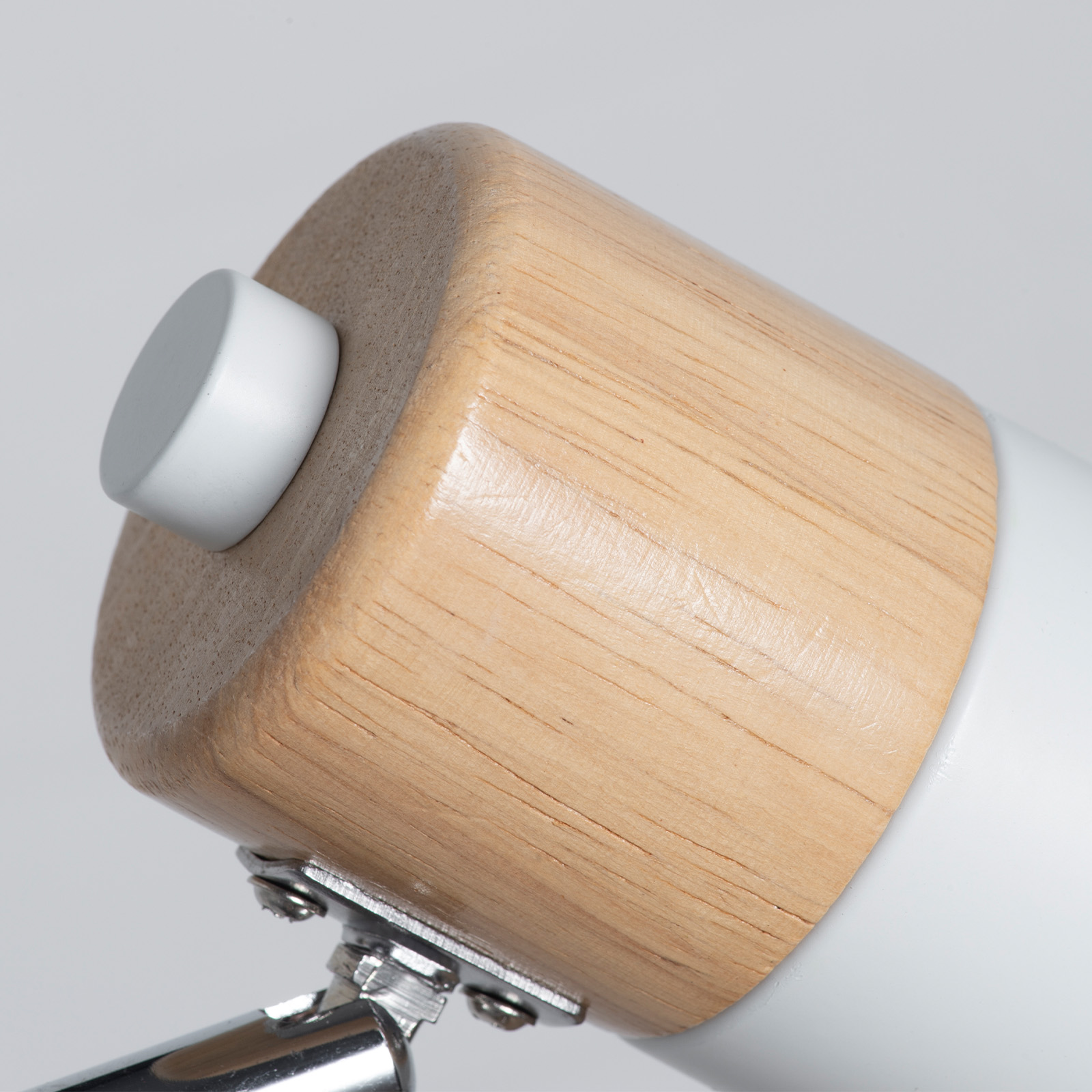 Cabezal de lámpara cilíndrico con veta de madera y pomo blanco.