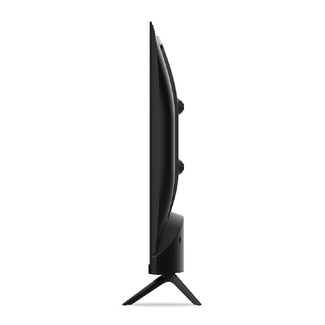 Un televisor negro visto de lado, con una base estrecha.