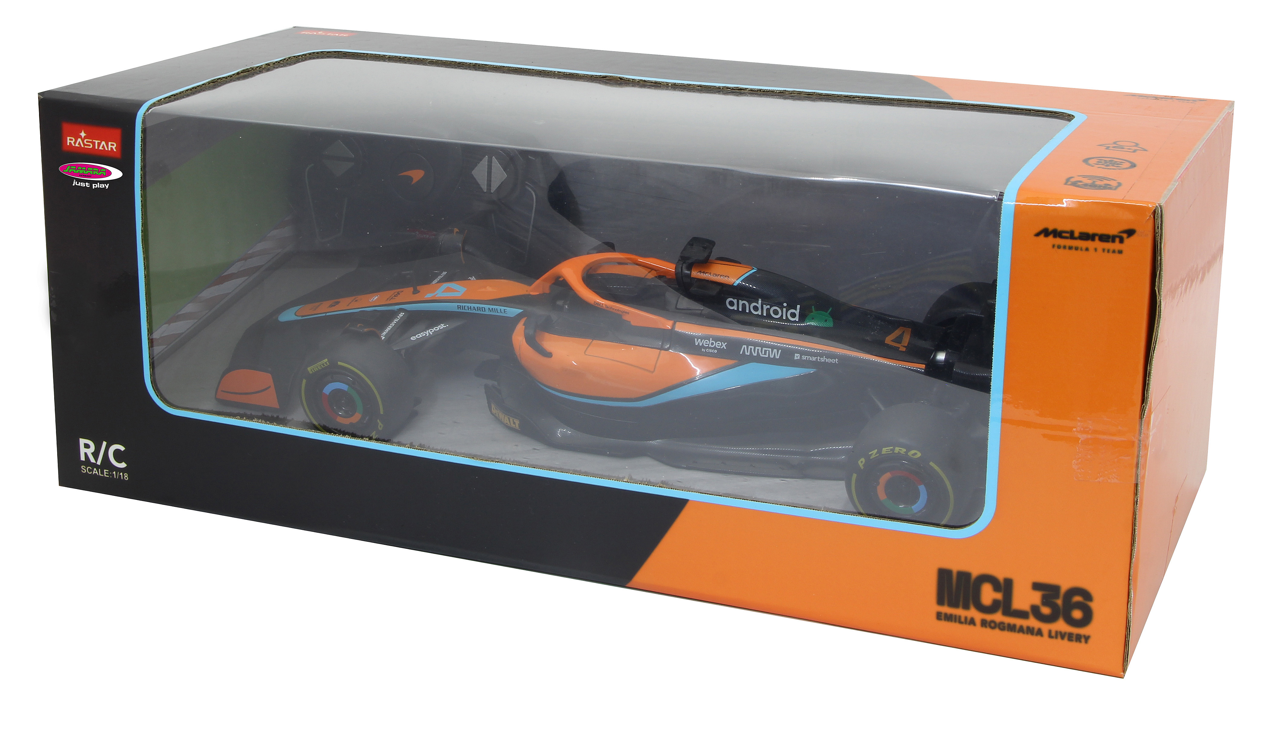 Ein McLaren Formel 1 Spielzeugauto mit oranger, blauer und schwarzer Lackierung in einer Box.
