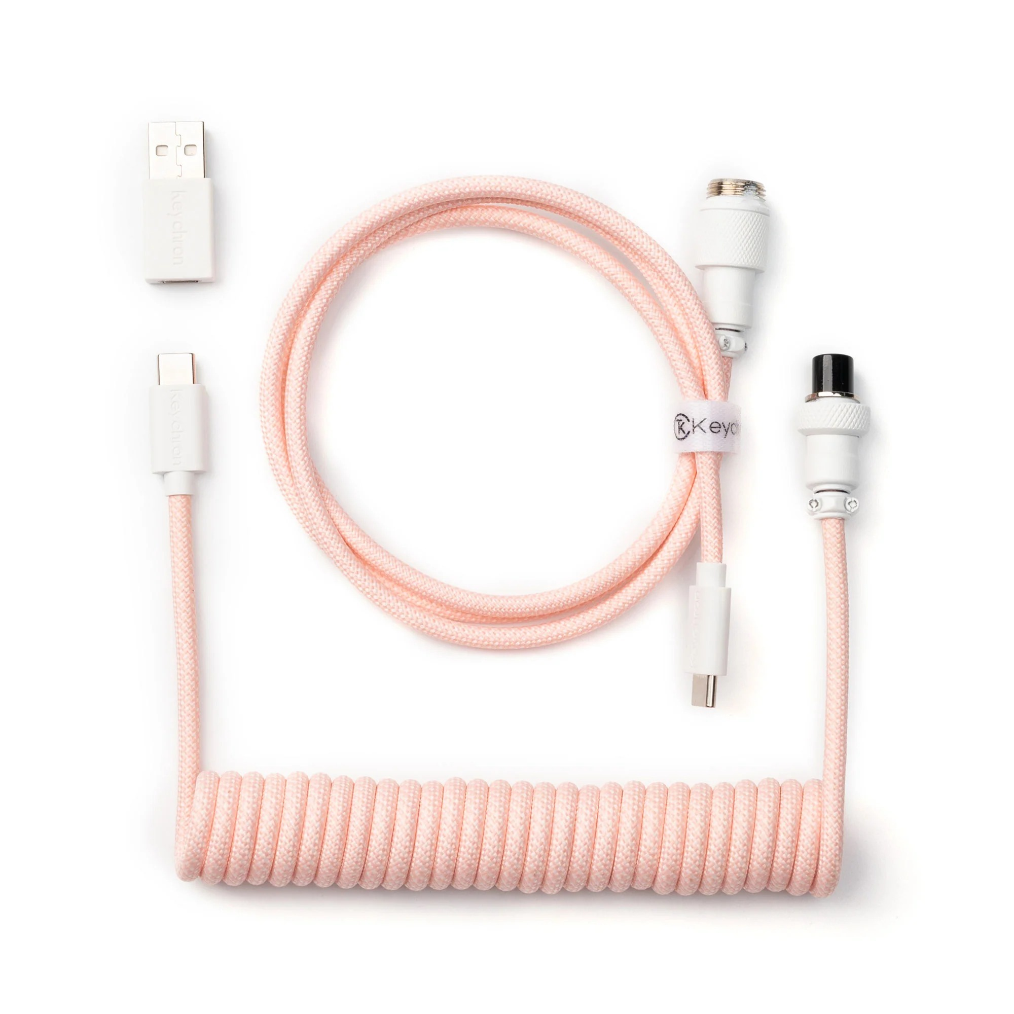 Różowy kabel spiralny ze złączami USB-C i USB-A.