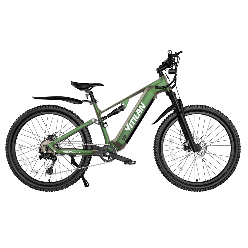 Zielony e-bike full-suspension z szerokimi oponami i czarnym siodłem.