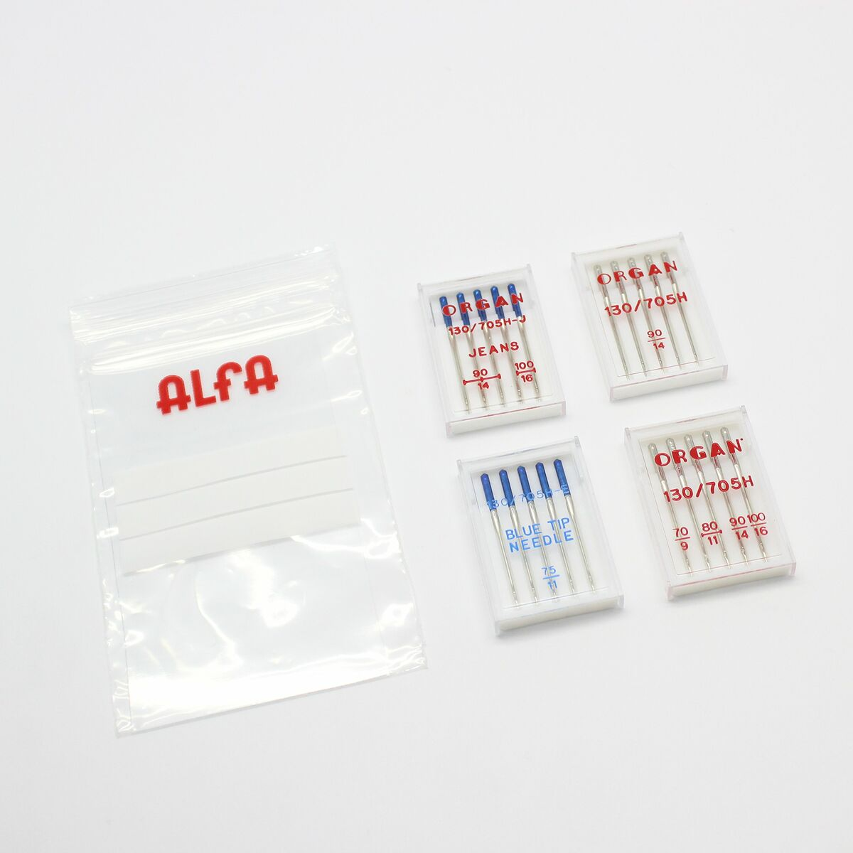 Un sacchetto di plastica con logo ALFA e quattro pacchi di aghi.